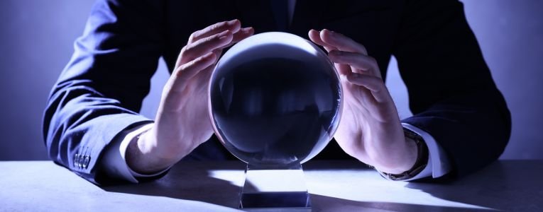 Businessman Using Crystal Ball to Predict Future at Table, Close⁠